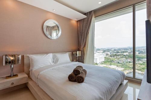 Katil atau katil-katil dalam bilik di R I V I E R A l Apartments l Guest Friendly l Jomtien Pattaya