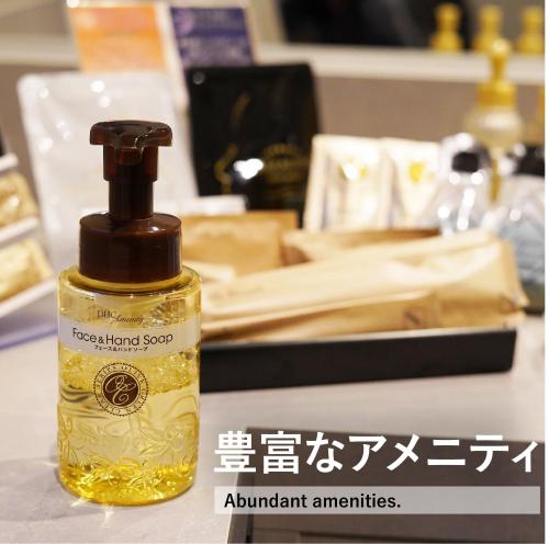a bottle of oil sitting on top of a counter at HOTEL FOURSEASONS KITAKAMI Adult only in Kitakami