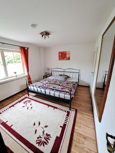 Katil atau katil-katil dalam bilik di Ferienwohnung "Am Seebach"