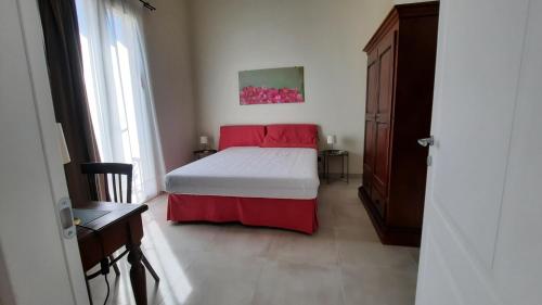 Katil atau katil-katil dalam bilik di Palazzo Ricciardi Residence