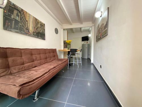a living room with a couch and a table at Villa GAUDÌ in Sant'Isidoro