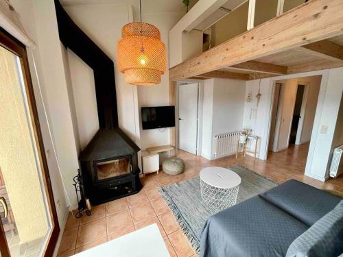 Ruang duduk di Apartamento Les Orenetes