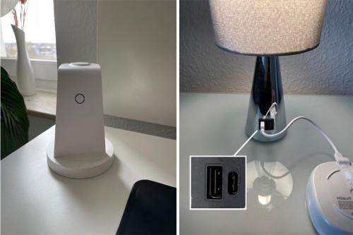 a lamp on a table next to a lamp on a desk at Modernes, zentrales Apartment in Troisdorf, Region Köln Bonn, 3 Etage, maximal für 4 Personen, Parkplatz & Netflix inklusive in Troisdorf