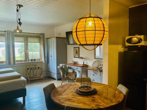 Katil atau katil-katil dalam bilik di zu Jeddelohs Bungalows & Apartments -Adult friendly