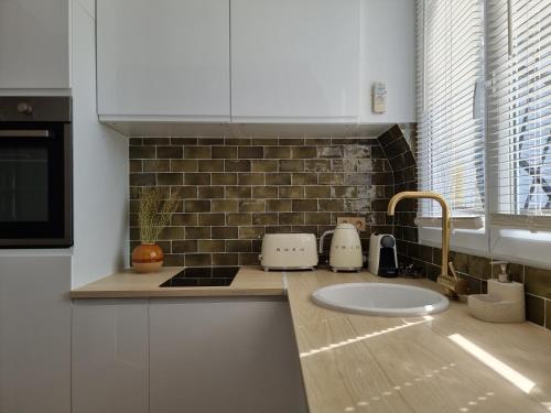 Photo de la galerie de l'établissement Au cœur de l’Avenue des Champs-Elysées / Arc de Triomphe, à Paris