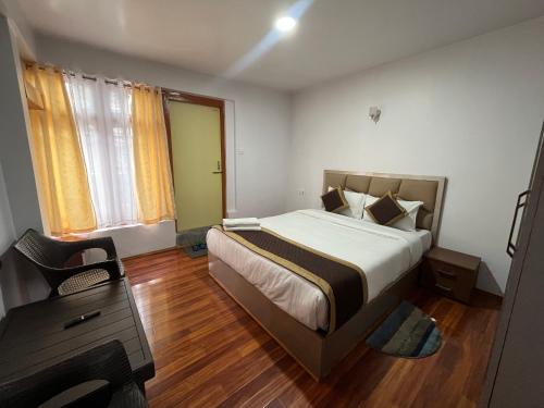 Katil atau katil-katil dalam bilik di Royal Vista - Guest House