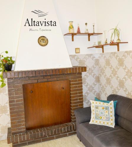 a brick fireplace with a sign that reads albuquerque insurance centre at AltaVista in Ari