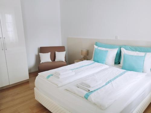 Postel nebo postele na pokoji v ubytování Apartments Wallas