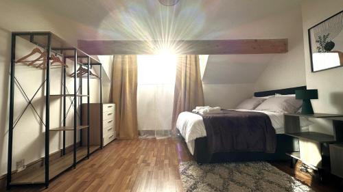 a bedroom with a bed and a dresser and a window at Leeds Cosy House in Leeds