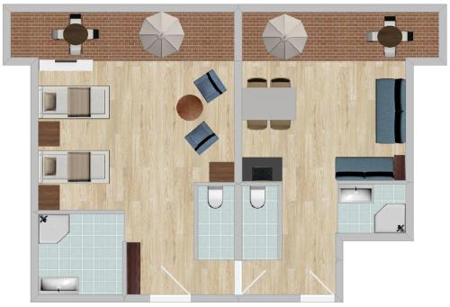 a floor plan of a building with furniture at Feriendorf am Maltschacher See in Feldkirchen in Kärnten