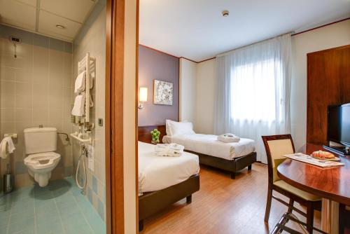 Voodi või voodid majutusasutuse Hotel Europa toas