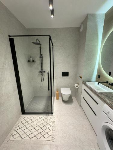 Ένα μπάνιο στο Apartament Zachodni 3 pokoje