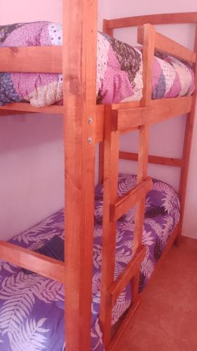 a pair of bunk beds in a room at 24/7 in Centenario