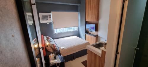 Penthouse 1 at Urban Deca EDSA by CityStudio