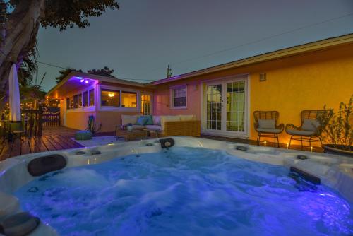 a hot tub in the backyard of a house at Paradise Palms - Movie Theater - Hot Tub - Pool - Arcade - Boat & RV Parking in Marathon