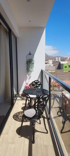 En balkon eller terrasse på Chez Alcinda