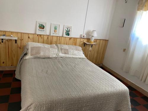 Ένα ή περισσότερα κρεβάτια σε δωμάτιο στο Buen pasar