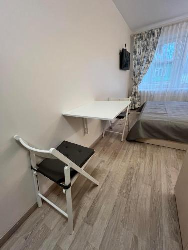 Postel nebo postele na pokoji v ubytování Girulių apartamentai prie jūros