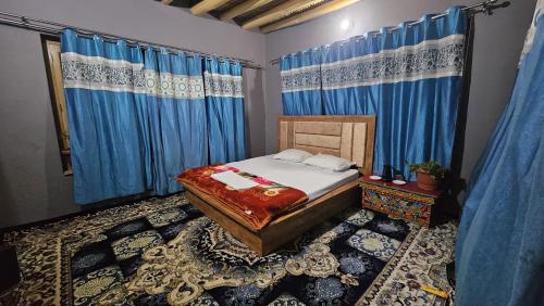 Postel nebo postele na pokoji v ubytování PASANG HOMESTAY