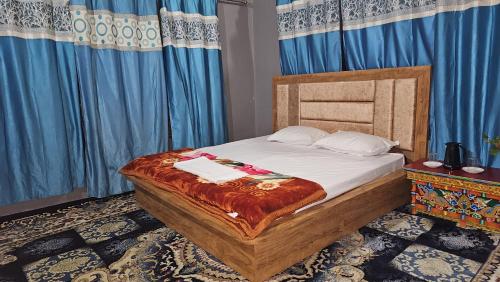 Postel nebo postele na pokoji v ubytování PASANG HOMESTAY