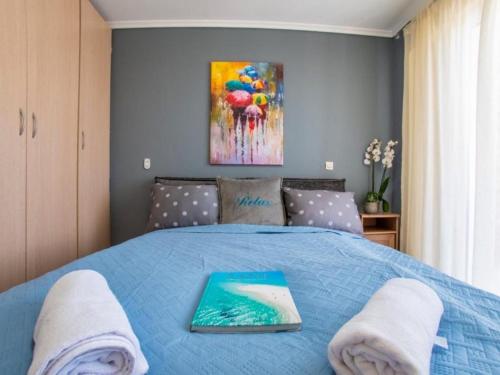Ένα ή περισσότερα κρεβάτια σε δωμάτιο στο Sani Relax Delux Villa 3