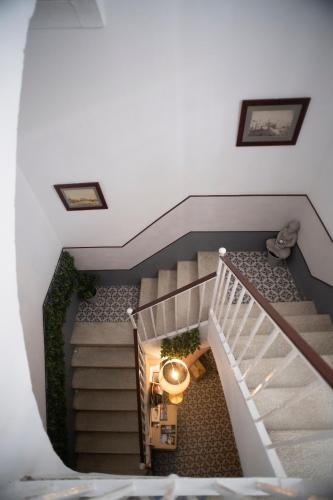 an overhead view of a staircase in a house at Palacete de La Alameda - Adults Only- in Cádiz