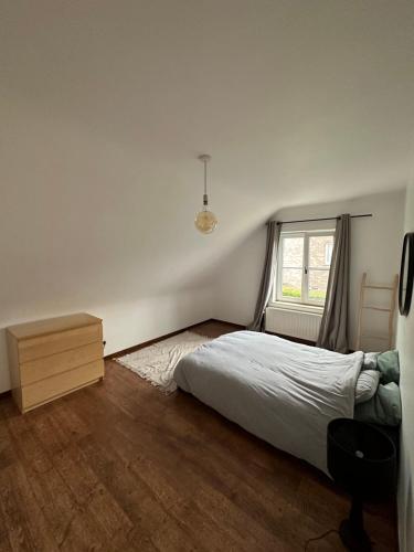 Łóżko lub łóżka w pokoju w obiekcie Charmante villa