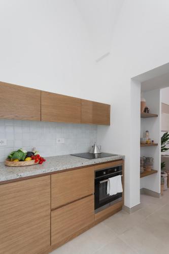 Kuchyň nebo kuchyňský kout v ubytování Casa Shirocco