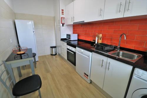 Apartamento laranja Quarteira