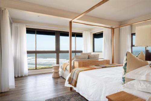 Ένα ή περισσότερα κρεβάτια σε δωμάτιο στο Prana Lodge