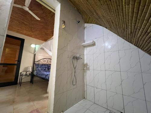 Koupelna v ubytování Magnifica Villa en corazón de Saly ! con piscina