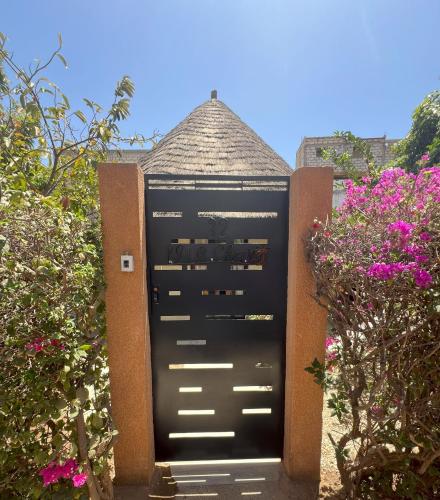 Fotografie z fotogalerie ubytování Magnifica Villa en corazón de Saly ! con piscina v destinaci Saly Portudal