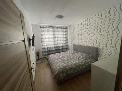 En eller flere senge i et værelse på Apartmán pod Kalváriou
