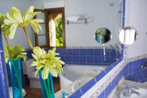 Kúpeľňa v ubytovaní Hotel Rural Castúo H CC 656