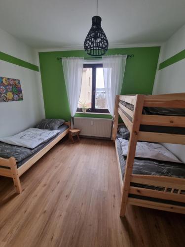 Postel nebo postele na pokoji v ubytování Ferienwohnung Cumbach