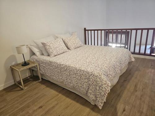 Una cama o camas en una habitación de APARTMENT IN THE CENTER OF THE OLD TOWN.