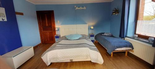Cama o camas de una habitación en Chambres d'hôtes des Ardennes