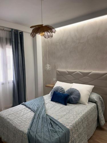 Postel nebo postele na pokoji v ubytování Apartamentos Amanecer