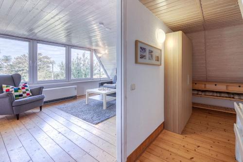Χώρος καθιστικού στο Reetgedecktes Traumhaus mit Panorama-Ostseeblick