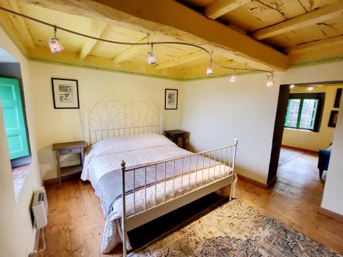 Кровать или кровати в номере La casa degli artisti