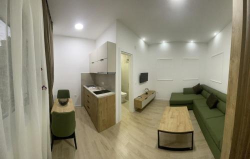 Coin salon dans l'établissement Apartments KinGs