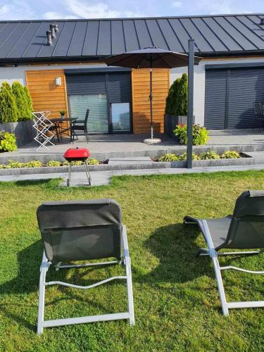 Κήπος έξω από το Apartamenty Jana Pawła