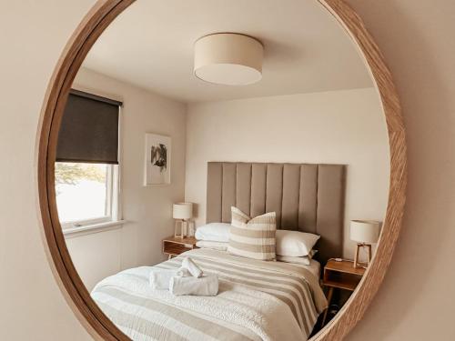 Ένα ή περισσότερα κρεβάτια σε δωμάτιο στο Beachfront Retreat On Revell