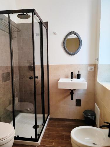 a bathroom with a shower and a sink at Gala Sardinia in Cagliari