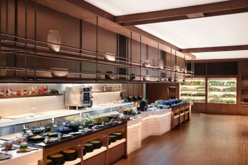 a large kitchen with aasteryasteryasteryasteryasteryasteryasteryasteryasteryasteryastery at Crowne Plaza Fiji Nadi Bay Resort & Spa by IHG in Nadi