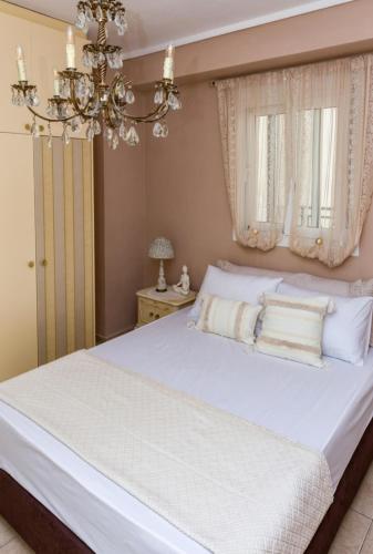 Ένα ή περισσότερα κρεβάτια σε δωμάτιο στο Kalendes home