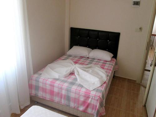 Postel nebo postele na pokoji v ubytování Avsa Cane Motel