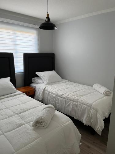 Un pat sau paturi într-o cameră la Casa amoblada en sector residencial