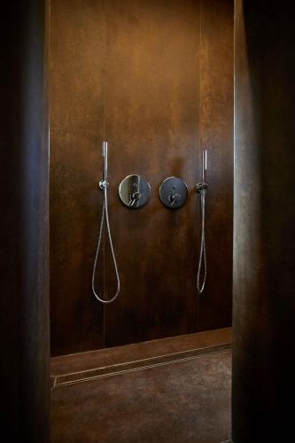 a bathroom stall with a shower with two hoses at Palazzina RIVA in Venice