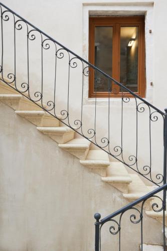 a set of stairs leading to a window at Palazzina RIVA in Venice